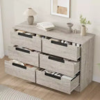 Commode six tiroirs à poignées intégrées, une unité de rangement compacte et peu encombrante, idéale pour les salons et les couloirs.
